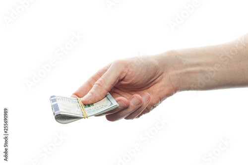 100 dollars cash money in male hand isolated on white background