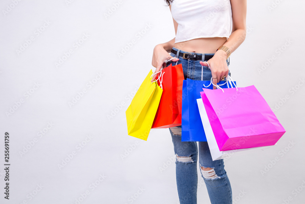 young women with shopping on white background