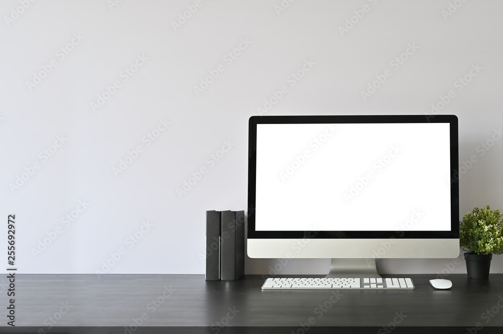 Workspace pc computer and books on black office desk and copy space. Workspace pc computer and books on black office desk and copy space.