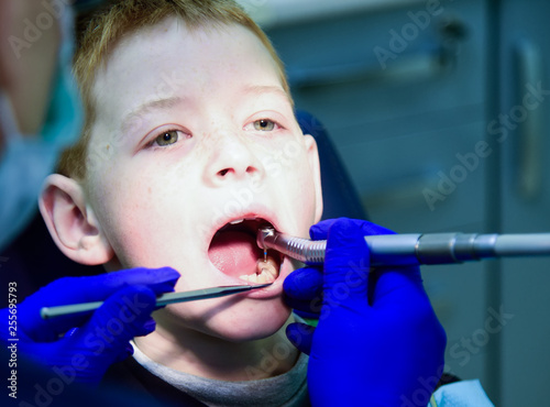 Tooth treatment in a dental clinic. Children's dental medical department