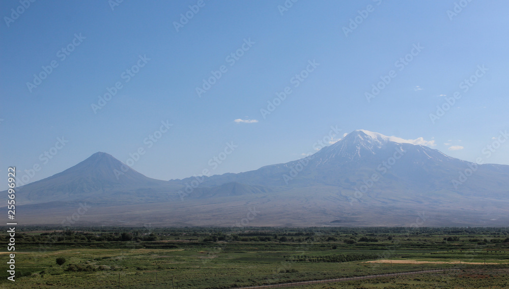 Mount Ararat from distance with green fields