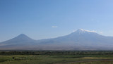 Mount Ararat from distance with green fields