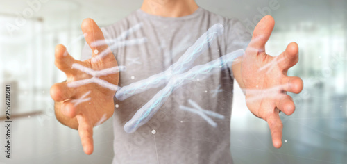 Businessman holding a Group of chromosome with DNA inside isolated on a background 3d rendering