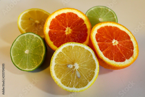 Citrus fruit halves. Lemons, limes and oranges