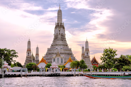 Temple of Dawn in Bangkok Thailand. Sitting majestically on the Thonburi side of the Chao Phraya River  the legendary Wat Arun is one of the most striking riverside landmarks of Thailand.