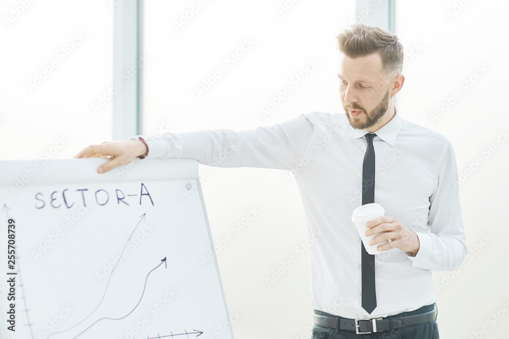 close up. businessman makes a presentation of a new investment project close up. businessman makes a presentation of a new investment project