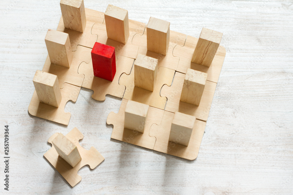 Leadership team and new employee abstract business concept with puzzle and block Leadership team and new employee abstract business concept with puzzle and block