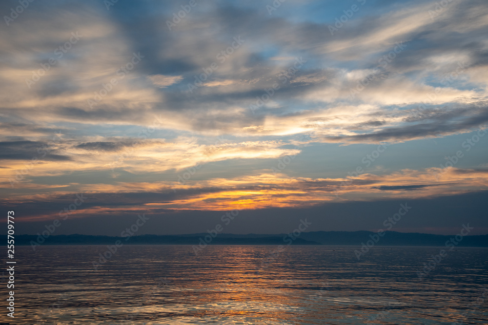 Dramatic sunset on Lake Garda, Sirmione, Lombardy, Italy Dramatic sunset on Lake Garda, Sirmione, Lombardy, Italy