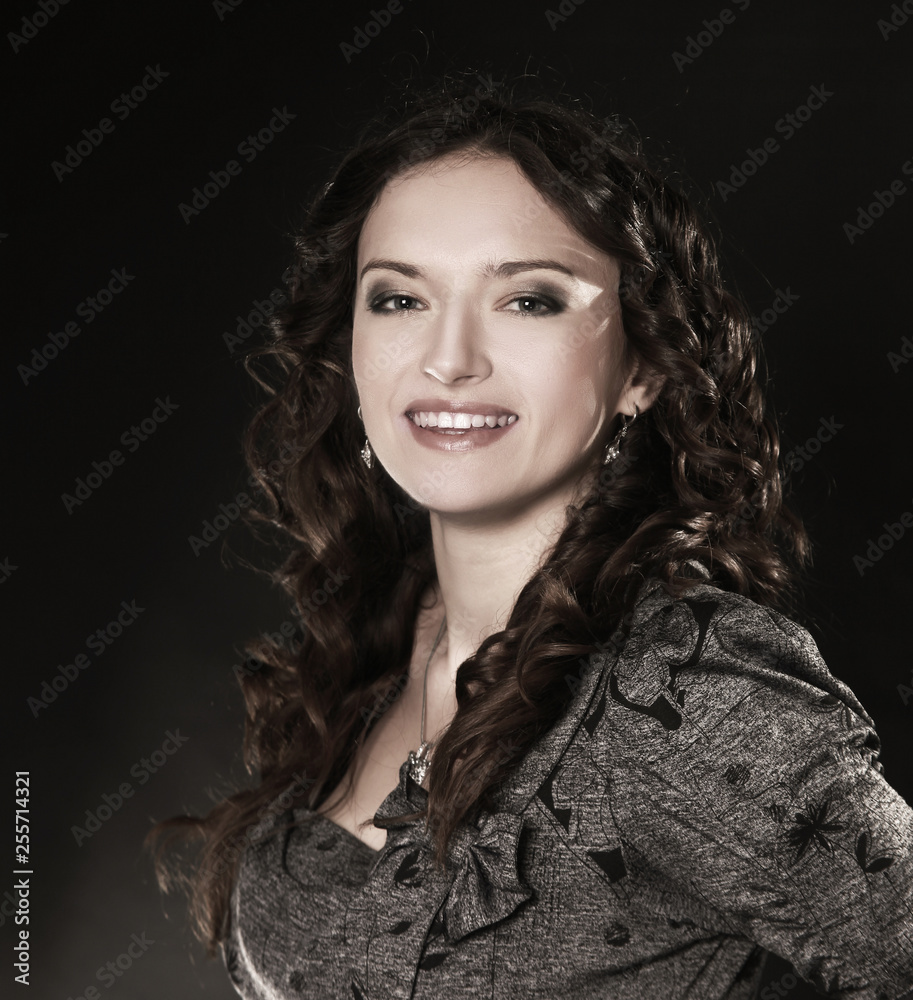 portrait of a smiling beautiful woman. isolated on black portrait of a smiling beautiful woman. isolated on black