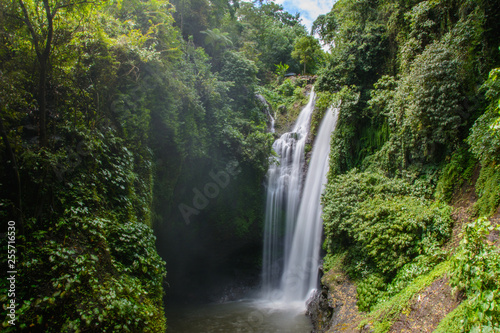 Tropical waterfall in jungle of Bali island, Indonesia