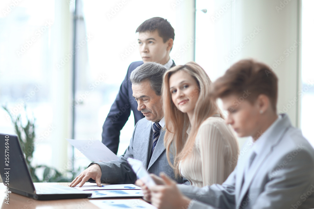 close up.young business woman and the business teams in the workplace in the office close up.young business woman and the business teams in the workplace in the office