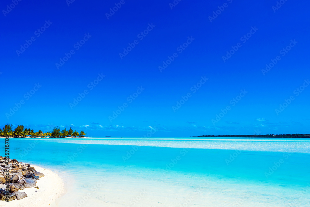 View of the sandy beach, Aitutaki island, Cook Islands, South Pacific. Copy space for text.   ..