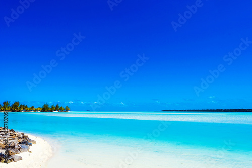 View of the sandy beach, Aitutaki island, Cook Islands, South Pacific. Copy space for text. ..