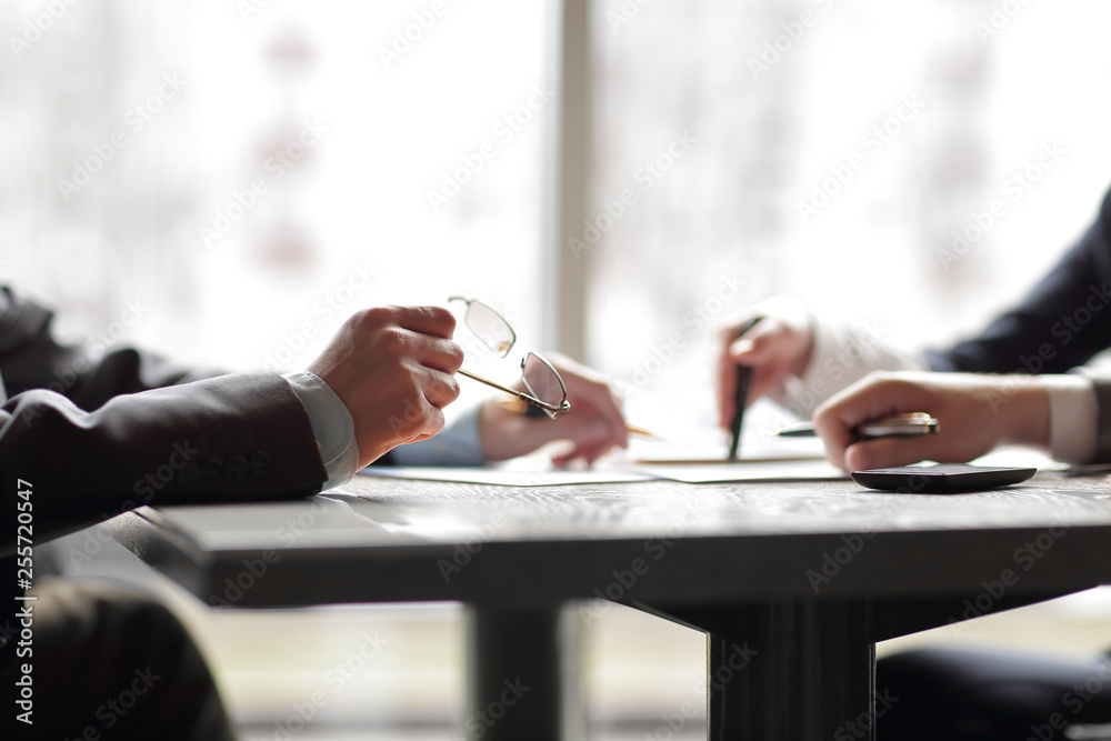 close up. business people discussing financial information
