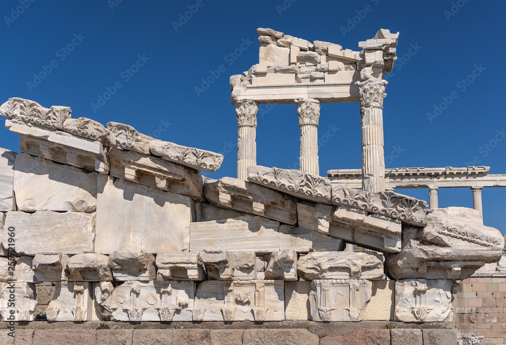 Detail of temple of Trajan at Pergamon, historical artifacts, columns, blue sky Bergama, İzmir, Turkey