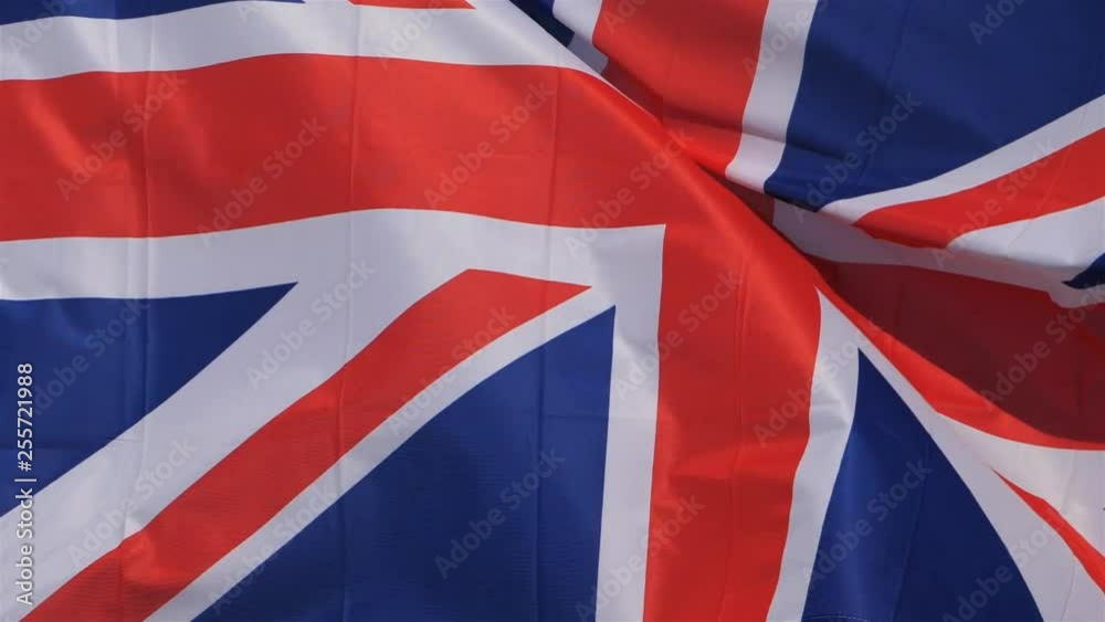 The national British flag waving in the wind. The national British flag waving in the wind.