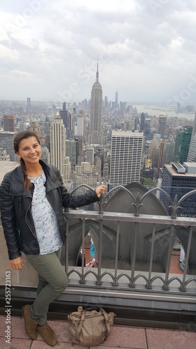hot sexy breathtaking woman on top of rockefeller center new york