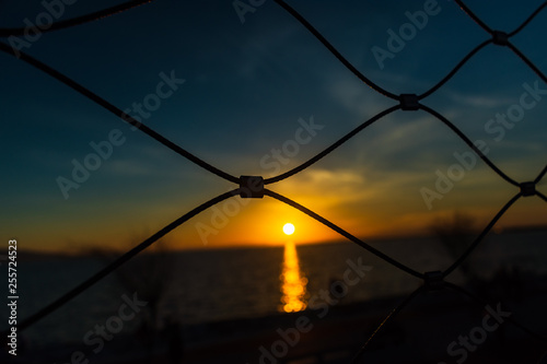 Sunset behind wire braids, Izmir, Turkey