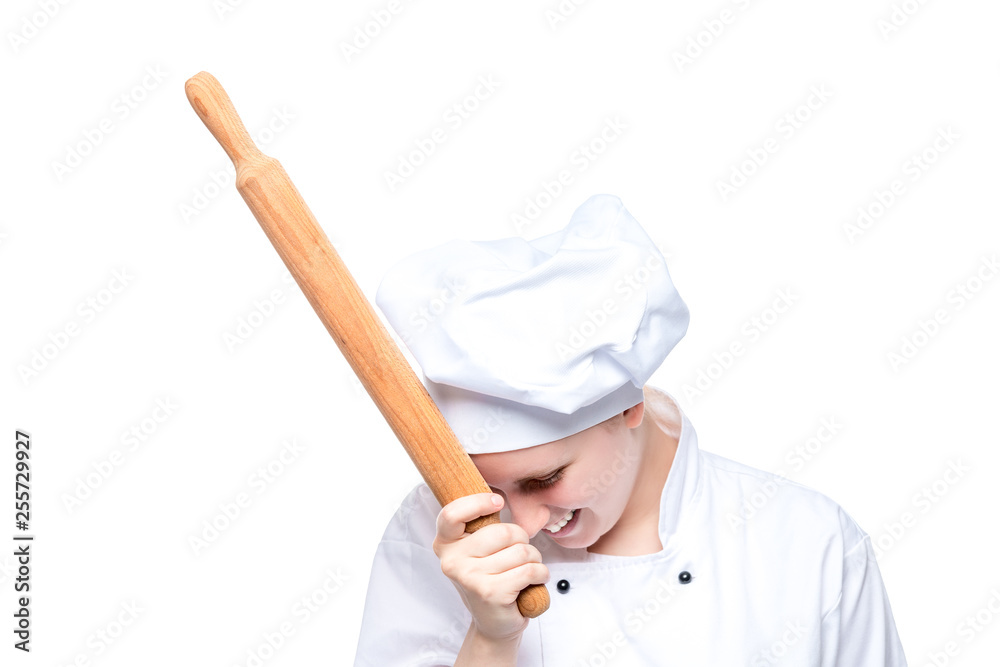 laughing cheerful chef with a rolling pin posing on a white background, portrait isolated
