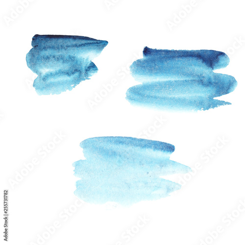 Abstract spot and  brushstrokes from blue watercolor background. hand drawn