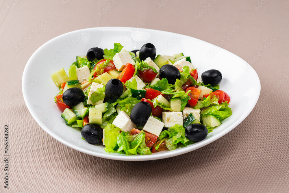 salad in a white plate salad in a white plate