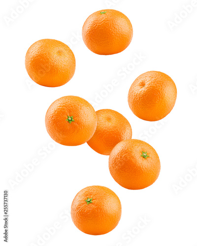 Falling mandarin, tangerine, isolated on white background, clipping path, full depth of field