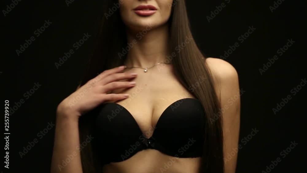 Portrait of a beautiful brunette in a cap on a black background Portrait of a beautiful brunette in a cap on a black background