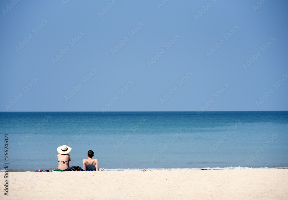 Couples on the beach in Summer holiday,Phuket, Thailand Couples on the beach in Summer holiday,Phuket, Thailand