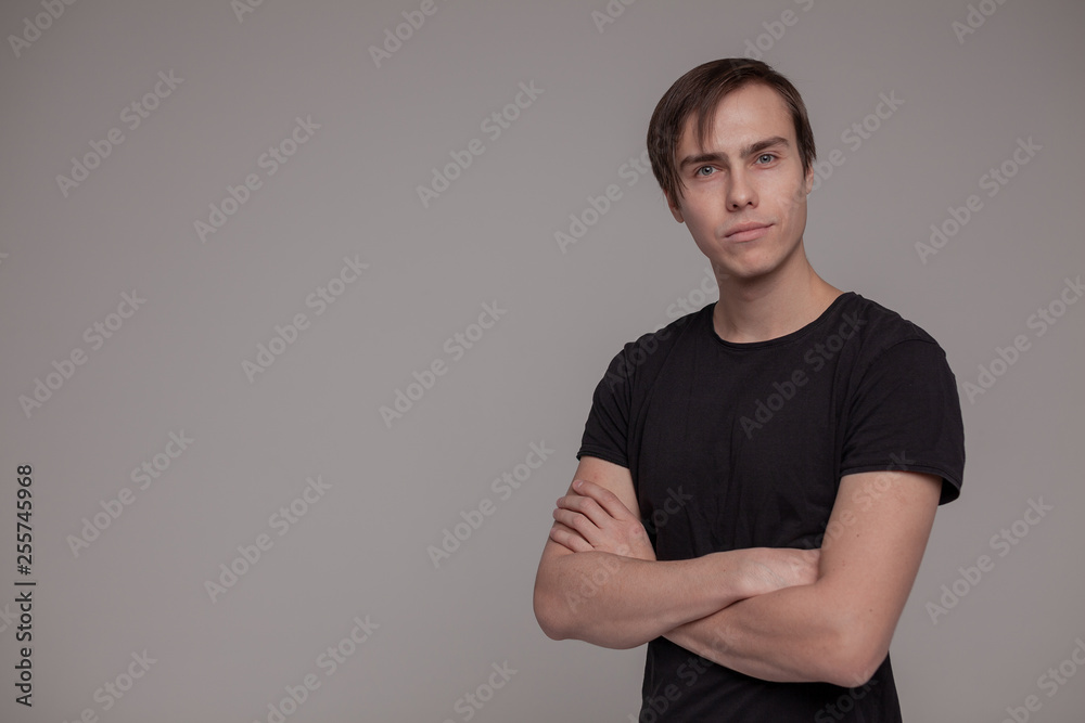 White young man in a black T-shirt. White young man in a black T-shirt.