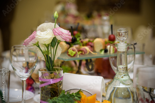 Beautiful restaurant interior table decoration for wedding or event. Flower Wedding Table Decoration