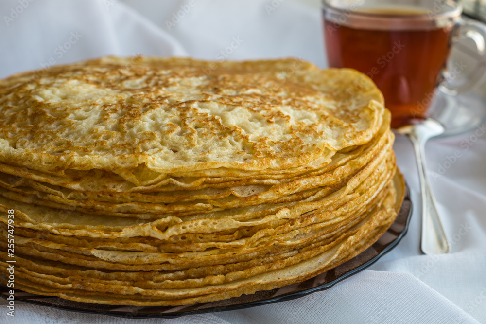 Russia, Severodvinsk, a stack of homemade Russian pancakes, close-up. The Concept of a Holiday Maslenitsa