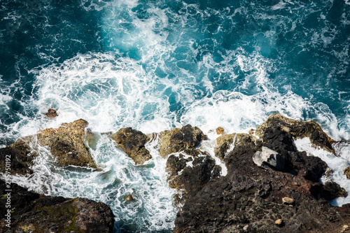 Waves splashing at the shore of Flores island, the Azores.