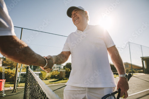 Close up of a senior man on a tennis court © Jacob Lund
