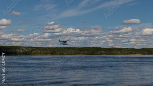Float plane low pass over river