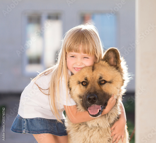 Girl, dog, embraces, home, fun, close up © erainbow