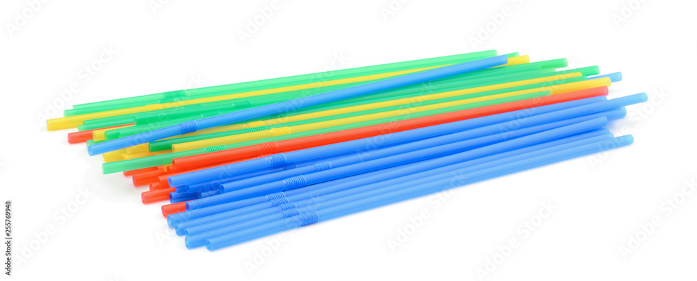 Multicolored tubes for cocktails isolated on white background