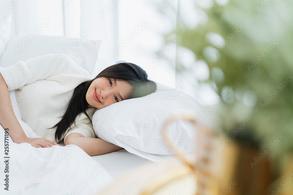 beautiful attractive asian woman white dress sleep on white duvet bed pillow home background morning light from curtain beautiful attractive asian woman white dress sleep on white duvet bed pillow home background morning light from curtain