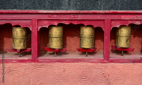 Buddhist Tibetian prayer wheels photo