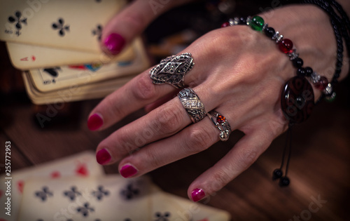 Gypsy fortune teller predicts the future with cards 