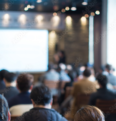 Wallpaper Mural Business Conference Photo. Executive Speaker on Stage. Business Presentation Presenter Speech at Tech Entrepreneur Meeting. Corporate Event with Audience. Expert Seminar Lecture Conference Event. Torontodigital.ca