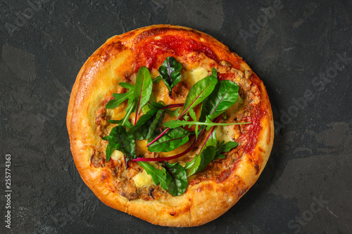 pizza, mushrooms, chicken, tomato sauce, cheese, (pizza ingredients and microgreen). hot pizza. Top view. copy space