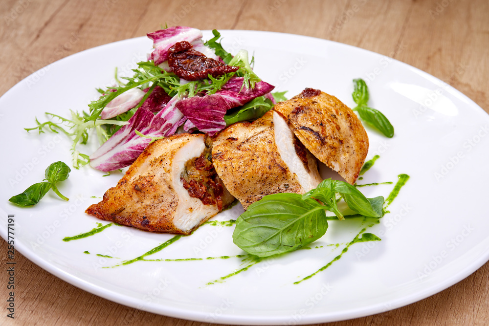 chicken breast with salad
