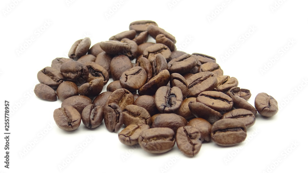 Close up of roasted coffee beans on white background Close up of roasted coffee beans on white background