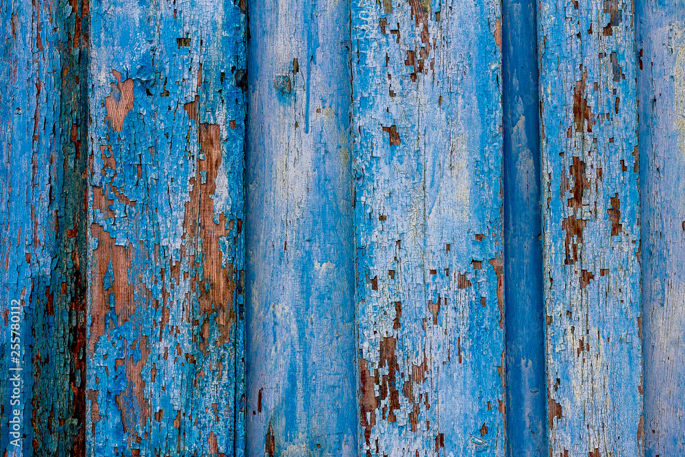 rubbed old blue wooden wall can serve as a background or for various ideas of building designers for fashionable trend textures in luxury houses, for repair or decoration, loft style is at the height rubbed old blue wooden wall can serve as a background or for various ideas of building designers for fashionable trend textures in luxury houses, for repair or decoration, loft style is at the height