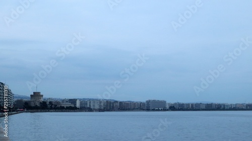 Thessaloniki waterfront, Greece. View of the White Tower on a cloudy evening.
