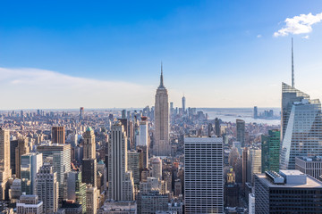 Wandcirkels Empire State Building Manhattan skyline op zonnige dag  © Worawat