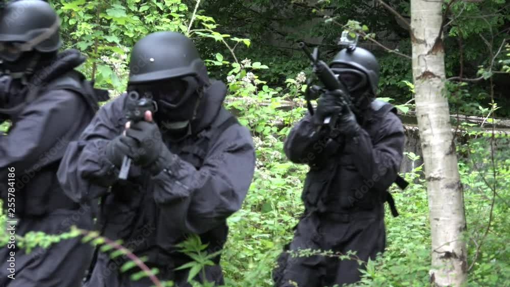 A Special Force Squad run in a wilderness area. A Special Force Squad run in a wilderness area.
