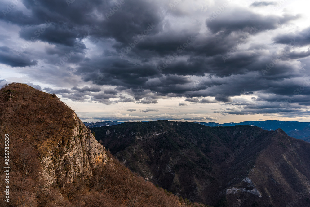 Dramatic clouds in Rhodope mountain, Bulgaria. Last days of winter landscape