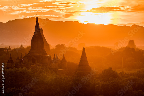 View of ancient temples in foggy morning  sunrise in Bagan  Myanmar  Burma 