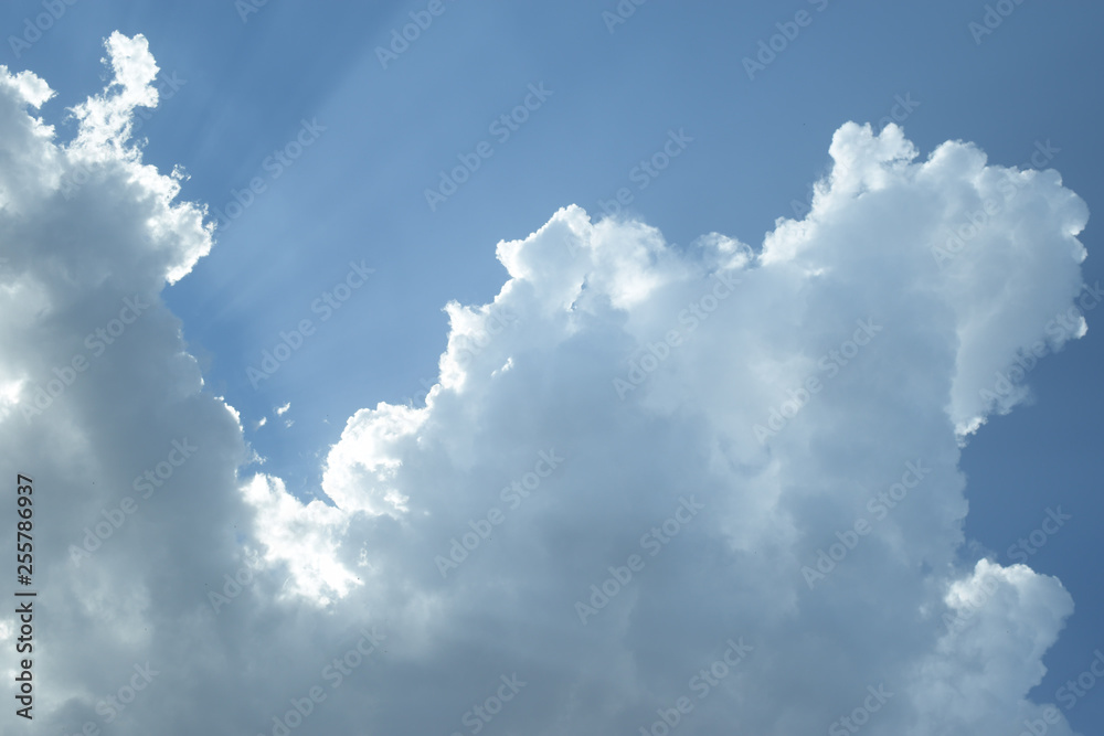 heavenly background with storm clouds and sunbeams heavenly background with storm clouds and sunbeams